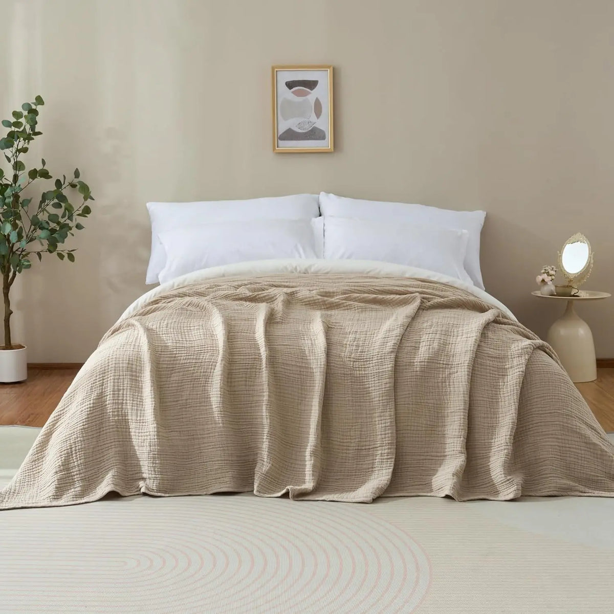 La Couverture Oniria en Sable sur un lit double
